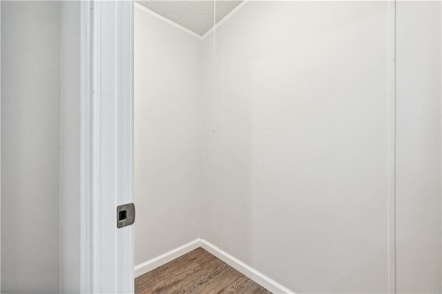 6670 George Ct, Cumming, GA 30041 - washroom with wood finished floors, ornamental molding, and baseboards