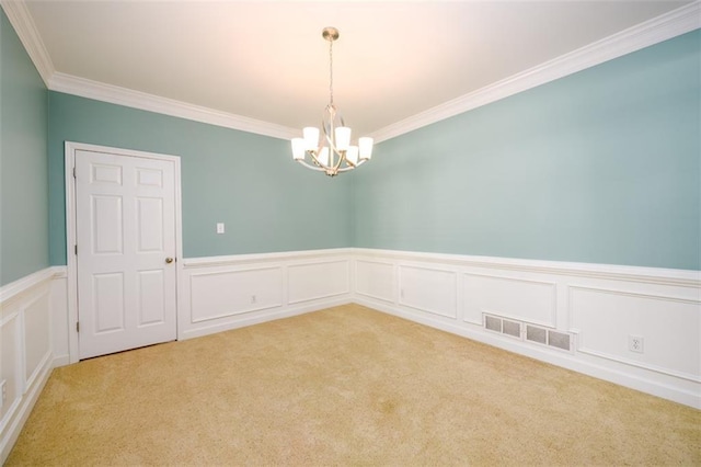 1304 Carrington Way, Lawrenceville, GA 30044 - unfurnished room featuring crown molding, carpet flooring, a chandelier, wainscoting, and a decorative wall