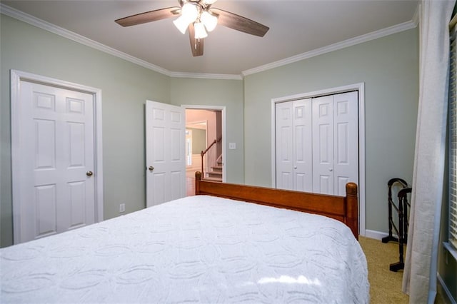 1304 Carrington Way, Lawrenceville, GA 30044 - carpeted bedroom featuring ornamental molding, a closet, a ceiling fan, and baseboards