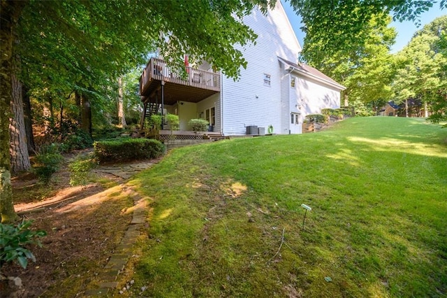 1304 Carrington Way, Lawrenceville, GA 30044 - view of green lawn featuring a deck and central air condition unit