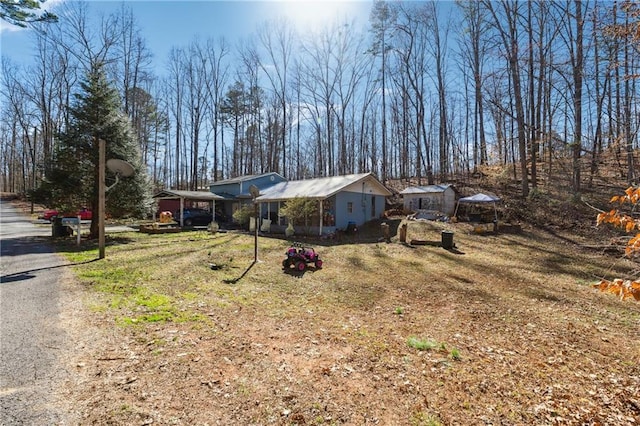 exterior space featuring a carport