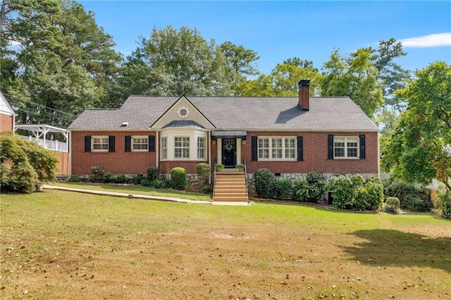 view of front facade featuring a front yard