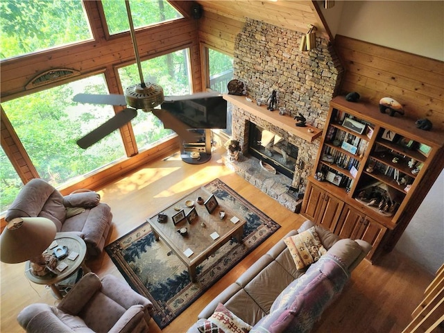 1115 Wild Turkey Blf, Jasper, GA 30143 - living room with wood finished floors, a fireplace, and vaulted ceiling
