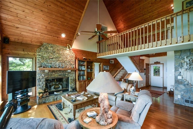1115 Wild Turkey Blf, Jasper, GA 30143 - living area featuring high vaulted ceiling, a stone fireplace, wooden ceiling, wood finished floors, and ceiling fan