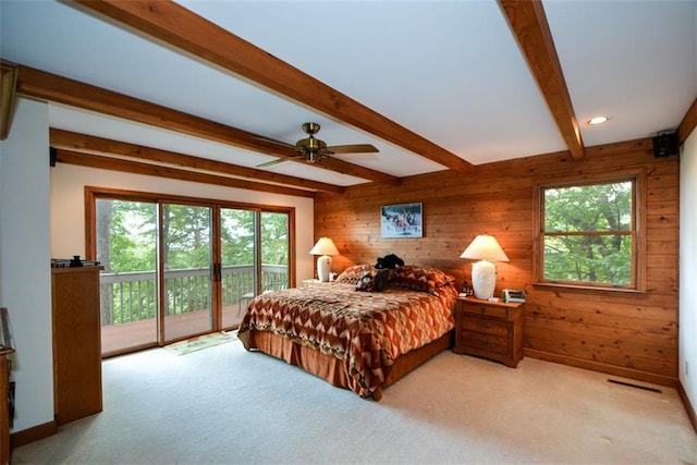 1115 Wild Turkey Blf, Jasper, GA 30143 - carpeted bedroom with access to exterior, beamed ceiling, multiple windows, wood walls, and ceiling fan
