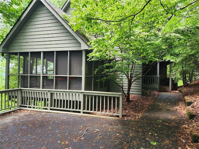 1115 Wild Turkey Blf, Jasper, GA 30143 - view of property exterior featuring a sunroom