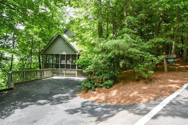 1115 Wild Turkey Blf, Jasper, GA 30143 - view of front facade with a sunroom