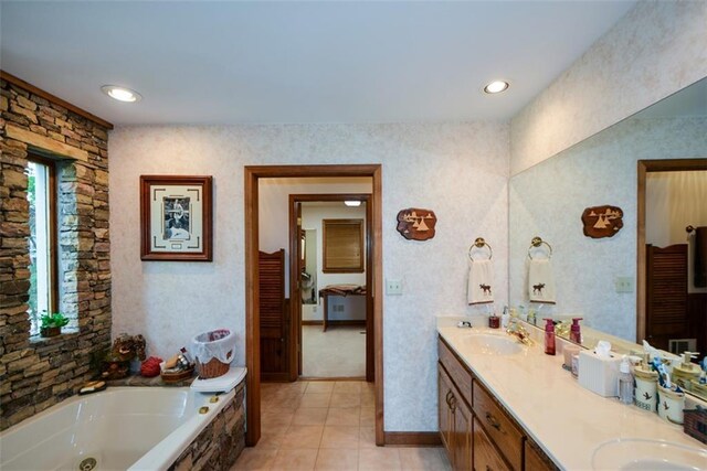 1115 Wild Turkey Blf, Jasper, GA 30143 - ensuite bathroom with double vanity, a jetted tub, tile patterned flooring, and recessed lighting
