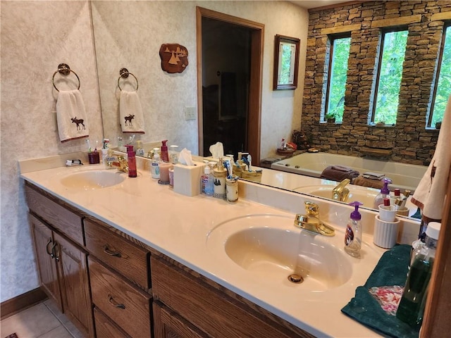 1115 Wild Turkey Blf, Jasper, GA 30143 - full bath with double vanity, a garden tub, and tile patterned flooring
