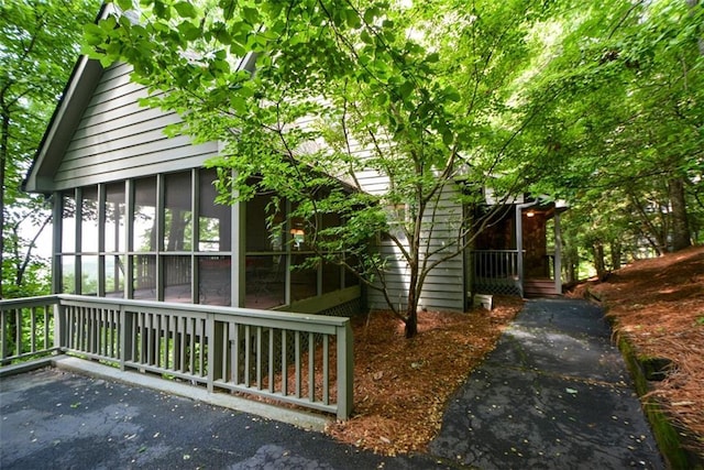 1115 Wild Turkey Blf, Jasper, GA 30143 - view of home's exterior with a sunroom