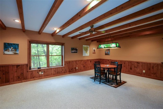 1115 Wild Turkey Blf, Jasper, GA 30143 - dining room featuring wainscoting, beam ceiling, wood walls, carpet, and a ceiling fan
