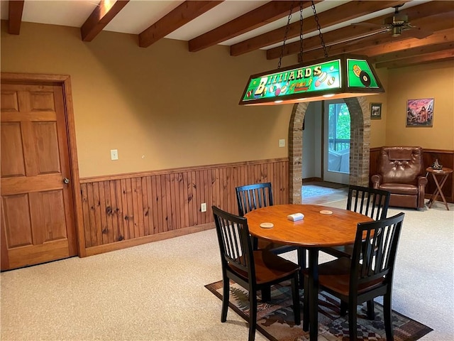 1115 Wild Turkey Blf, Jasper, GA 30143 - carpeted dining area featuring beamed ceiling, a wainscoted wall, and ceiling fan
