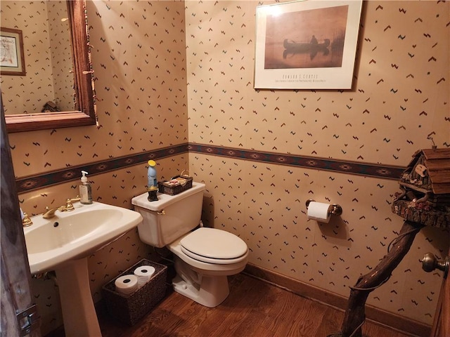1115 Wild Turkey Blf, Jasper, GA 30143 - half bathroom with wallpapered walls, wood finished floors, and toilet