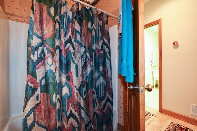 1115 Wild Turkey Blf, Jasper, GA 30143 - full bathroom with a shower with shower curtain and tile patterned flooring