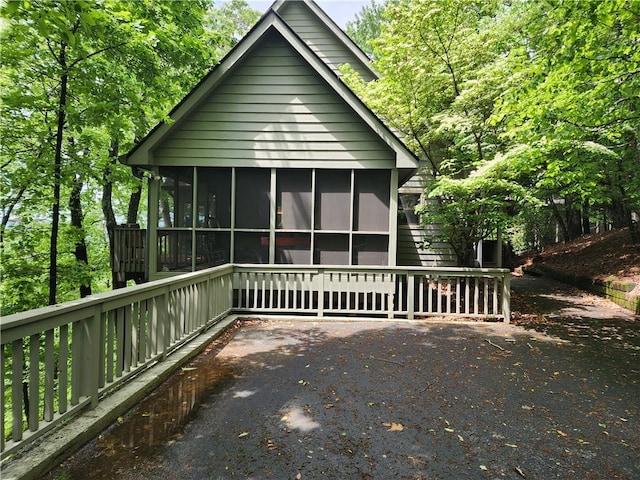 1115 Wild Turkey Blf, Jasper, GA 30143 - view of front facade with a sunroom