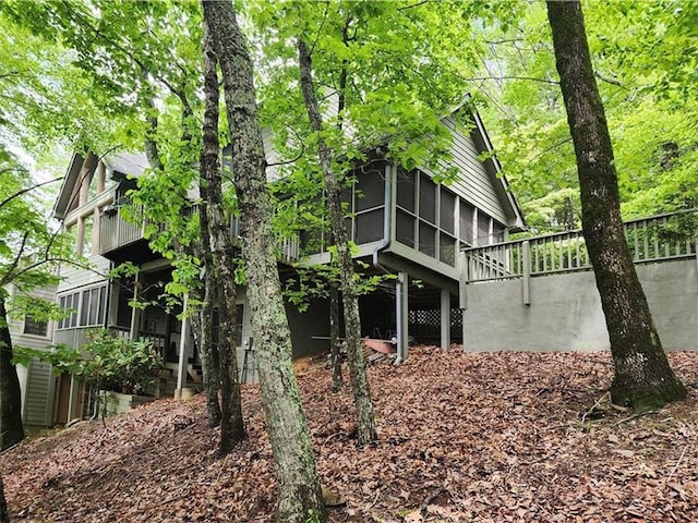 1115 Wild Turkey Blf, Jasper, GA 30143 - view of property exterior featuring a sunroom and a balcony