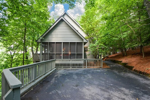1115 Wild Turkey Blf, Jasper, GA 30143 - back of house featuring a sunroom