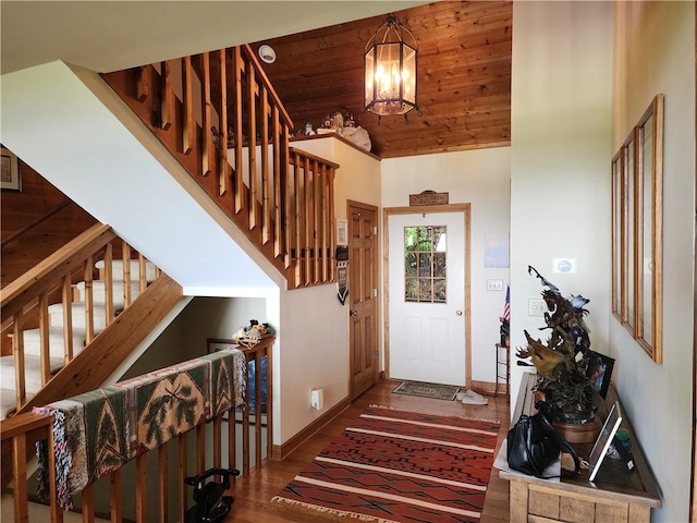 1115 Wild Turkey Blf, Jasper, GA 30143 - entrance foyer with wood finished floors, a chandelier, baseboards, wooden ceiling, and stairs