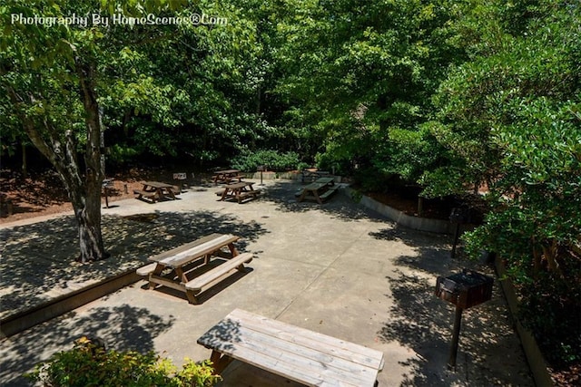 1115 Wild Turkey Blf, Jasper, GA 30143 - view of patio / terrace with a fire pit