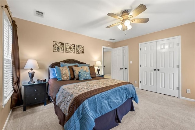 370 Fairleaf Ct, Alpharetta, GA 30022 - bedroom featuring carpet flooring, baseboards, two closets, and ceiling fan