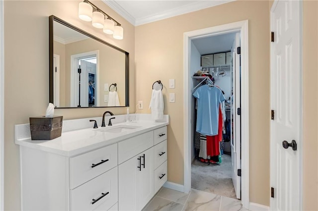 370 Fairleaf Ct, Alpharetta, GA 30022 - bathroom with marble finish flooring, baseboards, crown molding, vanity, and a walk in closet