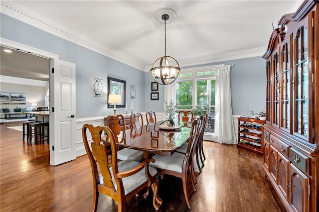 370 Fairleaf Ct, Alpharetta, GA 30022 - dining room with dark wood-style flooring, a chandelier, crown molding, and wainscoting