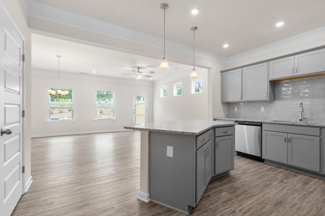 kitchen featuring gray cabinetry, ornamental molding, and dishwasher