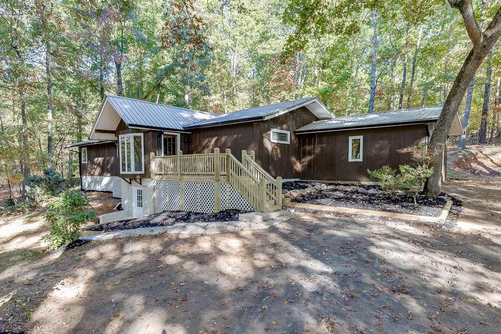 view of front of property with a wooden deck