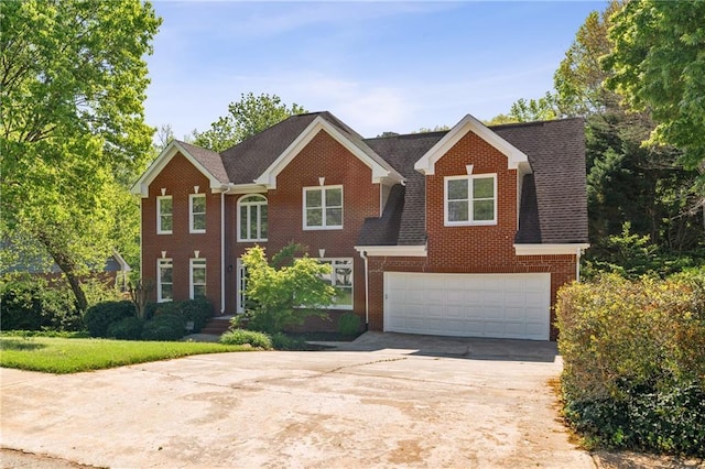 1755 Pinetree Pass Ln SW, Lilburn, GA 30047 - view of front of property with concrete driveway, a garage, and brick siding