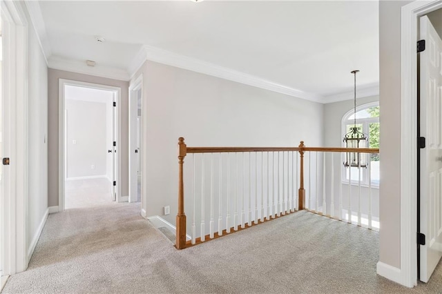 1755 Pinetree Pass Ln SW, Lilburn, GA 30047 - hall featuring an upstairs landing, baseboards, ornamental molding, and carpet