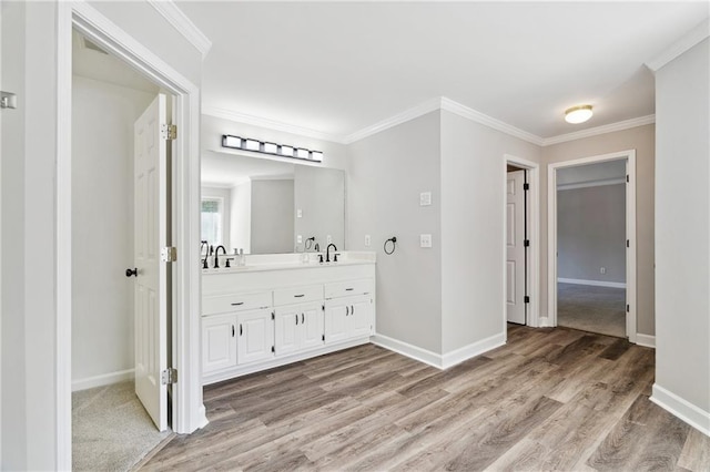 1755 Pinetree Pass Ln SW, Lilburn, GA 30047 - full bath featuring crown molding, wood finished floors, a sink, and baseboards