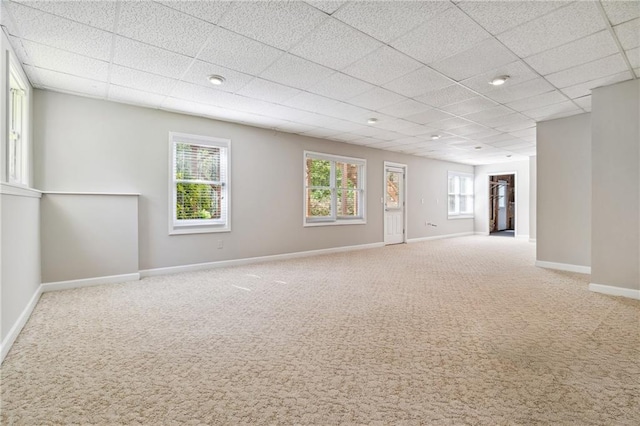 1755 Pinetree Pass Ln SW, Lilburn, GA 30047 - carpeted spare room featuring a paneled ceiling and baseboards