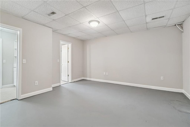 1755 Pinetree Pass Ln SW, Lilburn, GA 30047 - empty room with visible vents, baseboards, and finished concrete flooring