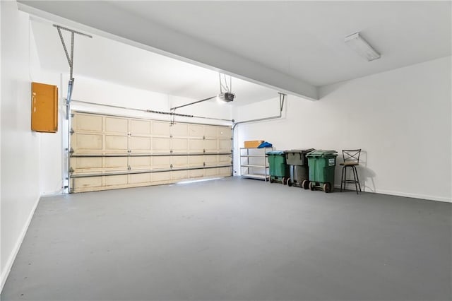 1755 Pinetree Pass Ln SW, Lilburn, GA 30047 - garage with a garage door opener and baseboards