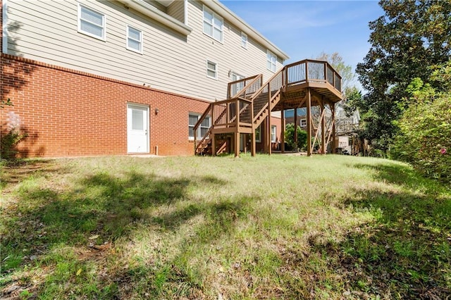 1755 Pinetree Pass Ln SW, Lilburn, GA 30047 - back of property featuring brick siding, a wooden deck, and stairway
