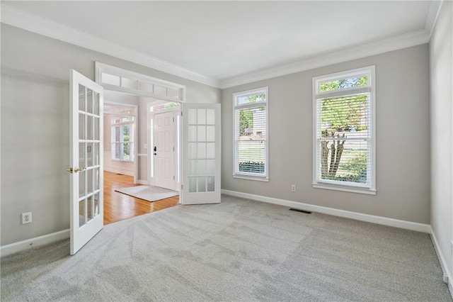 1755 Pinetree Pass Ln SW, Lilburn, GA 30047 - empty room featuring crown molding, french doors, and carpet floors