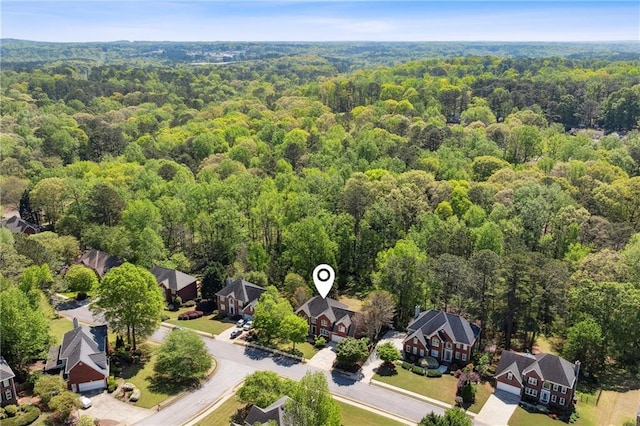 1755 Pinetree Pass Ln SW, Lilburn, GA 30047 - bird's eye view featuring a forest view and a residential view