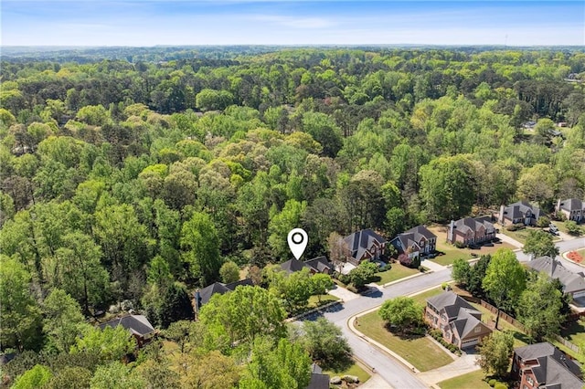 1755 Pinetree Pass Ln SW, Lilburn, GA 30047 - bird's eye view featuring a view of trees and a residential view