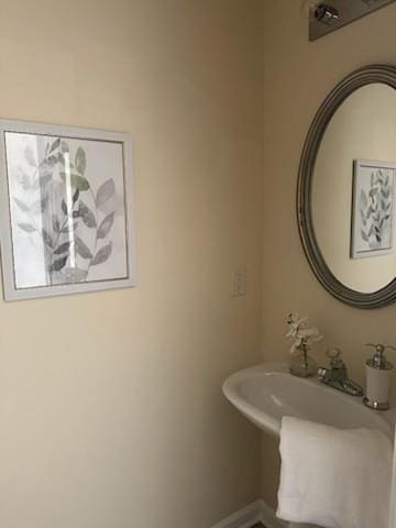 2991 Greyhawk Ln, Cumming, GA 30040 - bathroom featuring baseboards