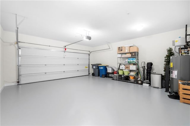 garage featuring a garage door opener and water heater