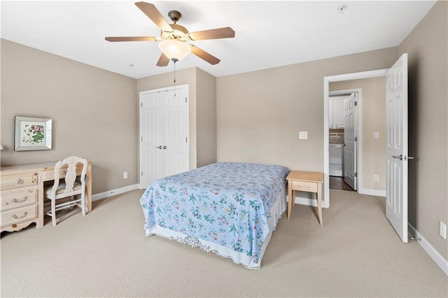 carpeted bedroom with ceiling fan and a closet