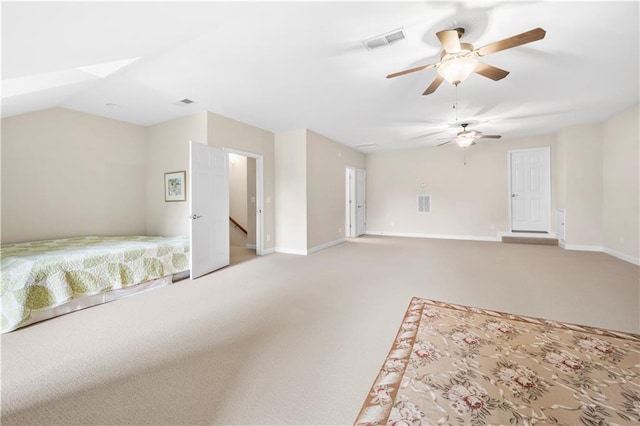 interior space featuring carpet flooring and ceiling fan