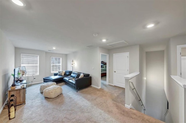 living room featuring light colored carpet