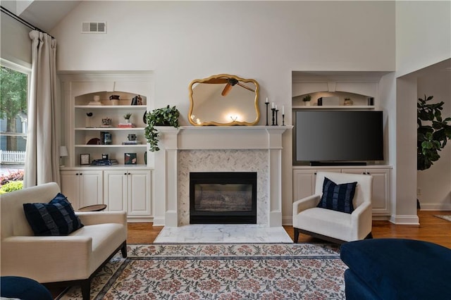 1360 Edmund Ct NE, Atlanta, GA 30306 - living room with wood finished floors and a fireplace