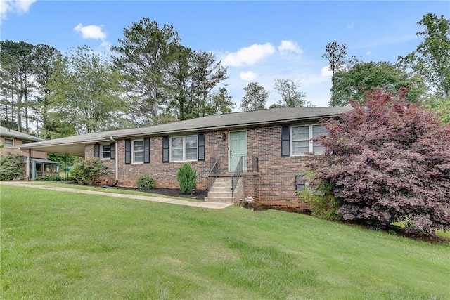 2653 Elkhart Cir SW, Marietta, GA 30064 - single story home with a front lawn, brick siding, and an attached carport