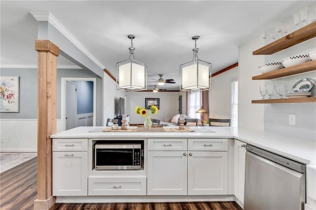 2653 Elkhart Cir SW, Marietta, GA 30064 - kitchen with stainless steel appliances, crown molding, open shelves, a ceiling fan, and light countertops
