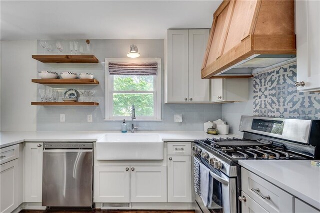 2653 Elkhart Cir SW, Marietta, GA 30064 - kitchen with appliances with stainless steel finishes, premium range hood, a sink, and tasteful backsplash