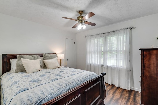 2653 Elkhart Cir SW, Marietta, GA 30064 - bedroom with dark wood-type flooring, ceiling fan, and baseboards