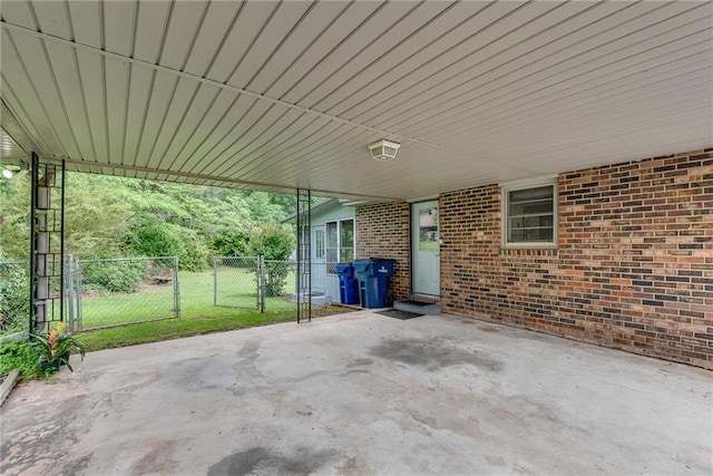 2653 Elkhart Cir SW, Marietta, GA 30064 - view of patio / terrace featuring a gate, an attached carport, and fence