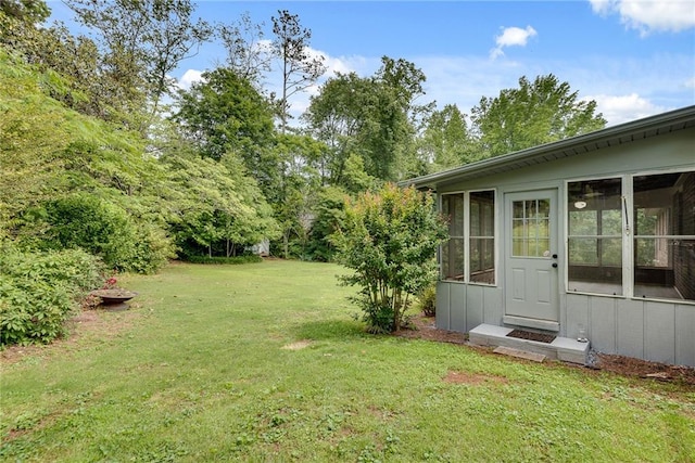 2653 Elkhart Cir SW, Marietta, GA 30064 - view of green lawn featuring a sunroom